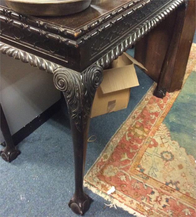 A Chippendale style card table.