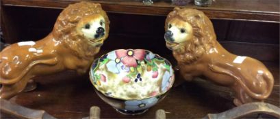 A pair of old Staffordshire dogs and a bowl.