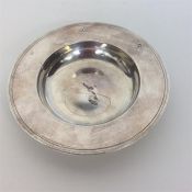 A heavy circular Armada dish with reeded side. Lon