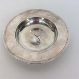 A heavy circular Armada dish with reeded side. Lon