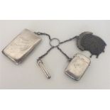 An unusual silver key ring mounted with cigarette