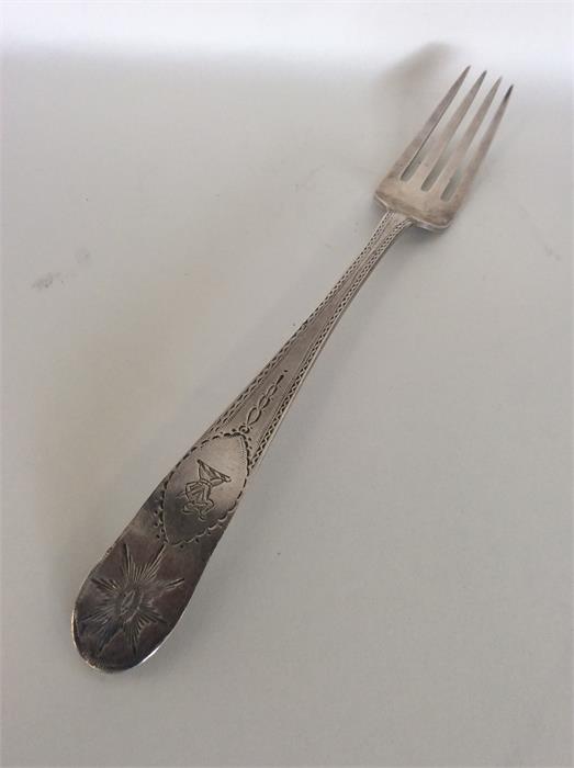 A large Irish Georgian silver bright cut fork. Dub