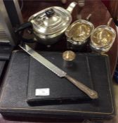 A plated tea service together with cased items.