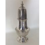 A good quality heavy Georgian style silver caster