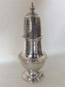 A good quality heavy Georgian style silver caster