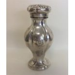 An Austrian silver sugar caster of baluster form w