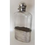 A silver mounted hinged top perfume flask. Approx.