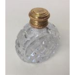 A good quality gold mounted and cut glass scent bo