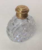 A good quality gold mounted and cut glass scent bo