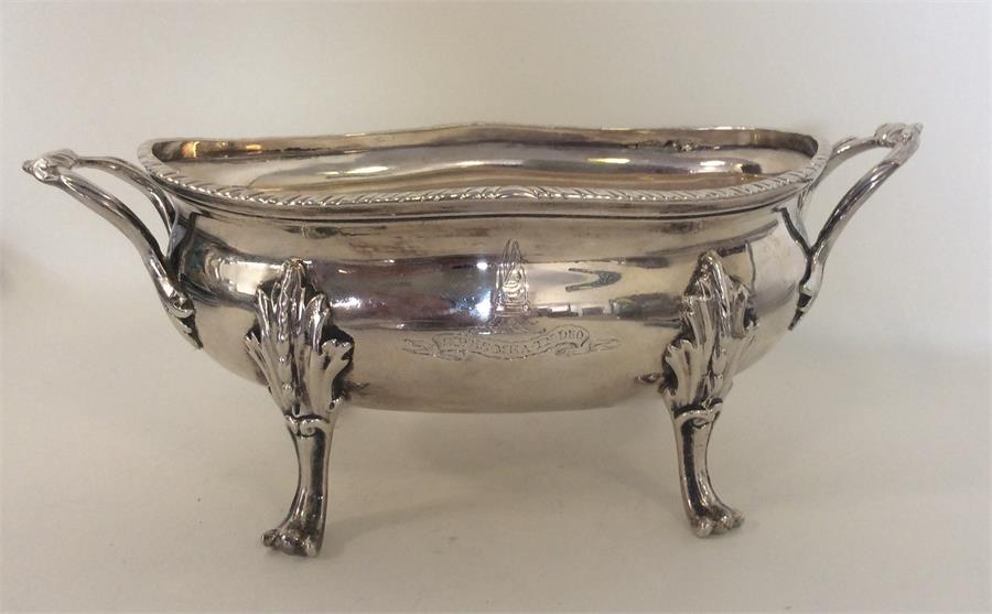 A good quality Georgian silver butter boat with ga