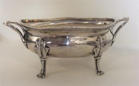 A good quality Georgian silver butter boat with ga