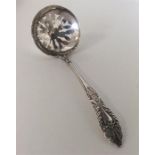 An attractive silver Edwardian sifter spoon decora