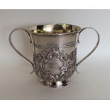 A good Georgian chased two handled loving cup deco
