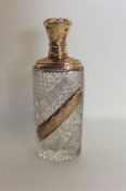 A good quality gold mounted scent bottle decorated