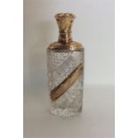 A good quality gold mounted scent bottle decorated