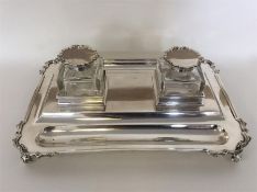 A good quality massive double inkstand with scroll