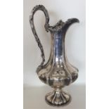 A large Victorian silver wine ewer of typical desi