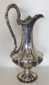 A large Victorian silver wine ewer of typical desi