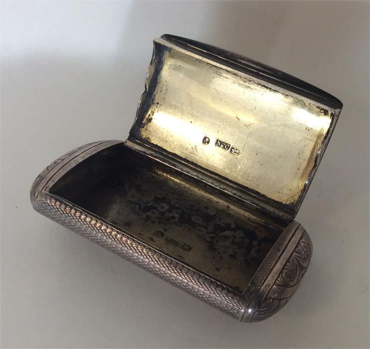 A heavy Victorian silver snuff box decorated with - Image 2 of 2