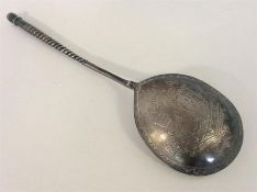 An early Russian silver spoon with twisted stem an