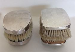 Two pairs of heavy engine turned brushes. Approx.