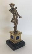 A good quality silver gilt figure of a harlequin w