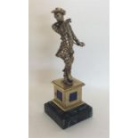 A good quality silver gilt figure of a harlequin w