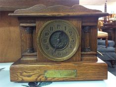 An oak mantle clock.