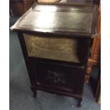 An Edwardian hinged top cupboard.