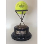 OF GOLFING INTEREST: A small silver golfing trophy