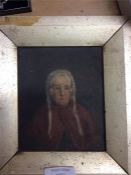 An old miniature oil painting of a lady.