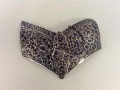 A good quality silver and niello buckle decorated