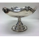A heavy good quality silver sweet dish with wavy e
