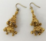 A pair of high carat filigree drop earrings with l