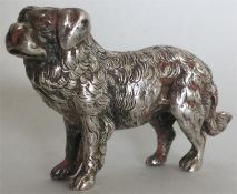 A cast silver model of a Retriever dog. London. By