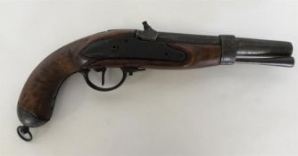 A large percussion capped pistol with mahogany bod