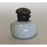 An attractive miniature silver mounted scent bottl