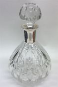 A Continental silver mounted decanter with lift-of