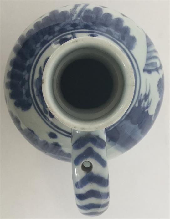 A Japanese porcelain blue and white oviform jug, t - Image 3 of 3