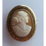 A 9 carat gold oval cameo of a lady's head. Approx