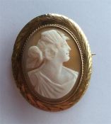 A 9 carat gold oval cameo of a lady's head. Approx