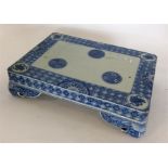 A rectangular Chinese porcelain blue and white sta