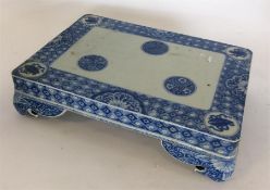 A rectangular Chinese porcelain blue and white sta