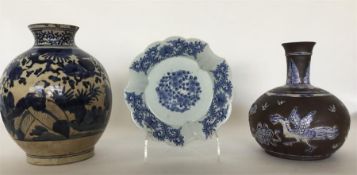 A Chinese-style oviform porcelain vase painted in b