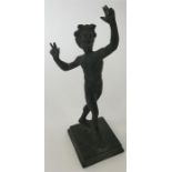 A brass statue in the form of a fawn in standing p