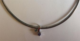 A cased drop pendant on fine link chain. Est. £20