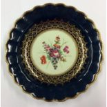 An 18th Century Worcester dark blue-ground dish fi