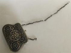A Russian silver filigree purse attractively decor