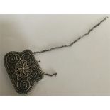 A Russian silver filigree purse attractively decor