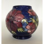 MOORCROFT: A large blue-ground oviform vase decora